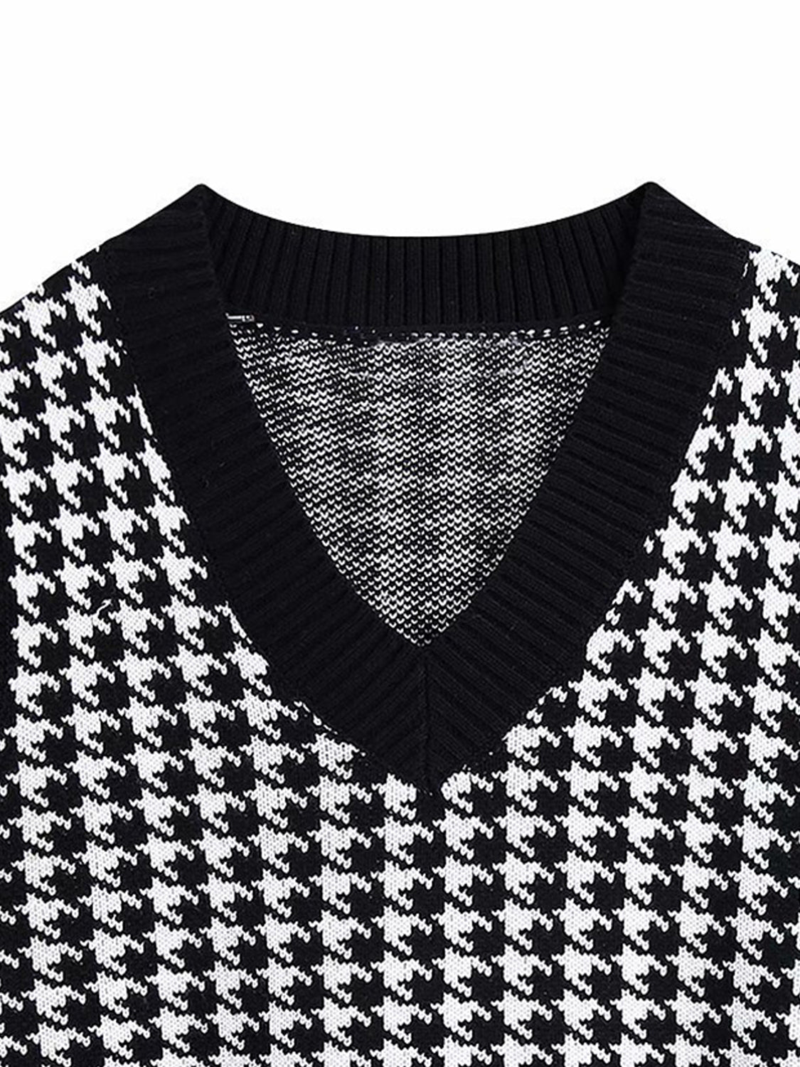 Houndstooth knit v-neck tank top in black and white with a ribbed neckline.