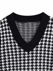 Houndstooth knit v-neck tank top in black and white with a ribbed neckline.