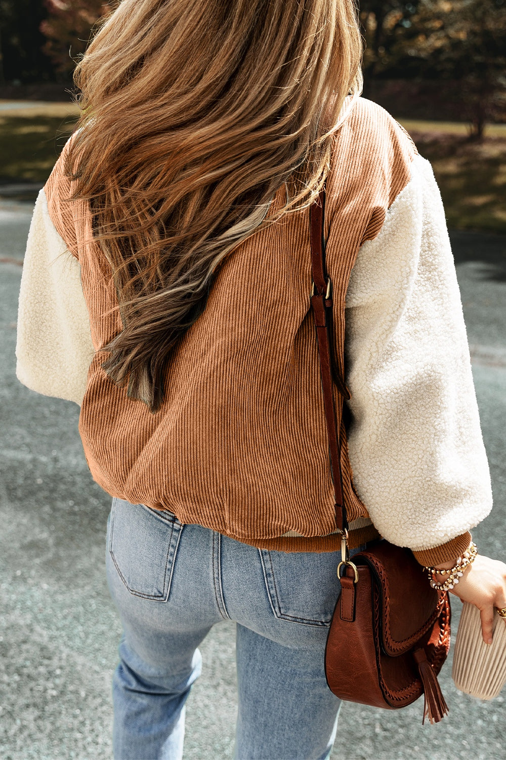 Corduroy bomber jacket with sherpa sleeves in Terracotta, casual contrast style.