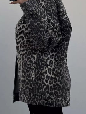 Oversized denim jacket in leopard print with button closure and chest pockets.