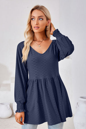 Dark Blue textured babydoll blouse with v-neck and smocked cuffs
