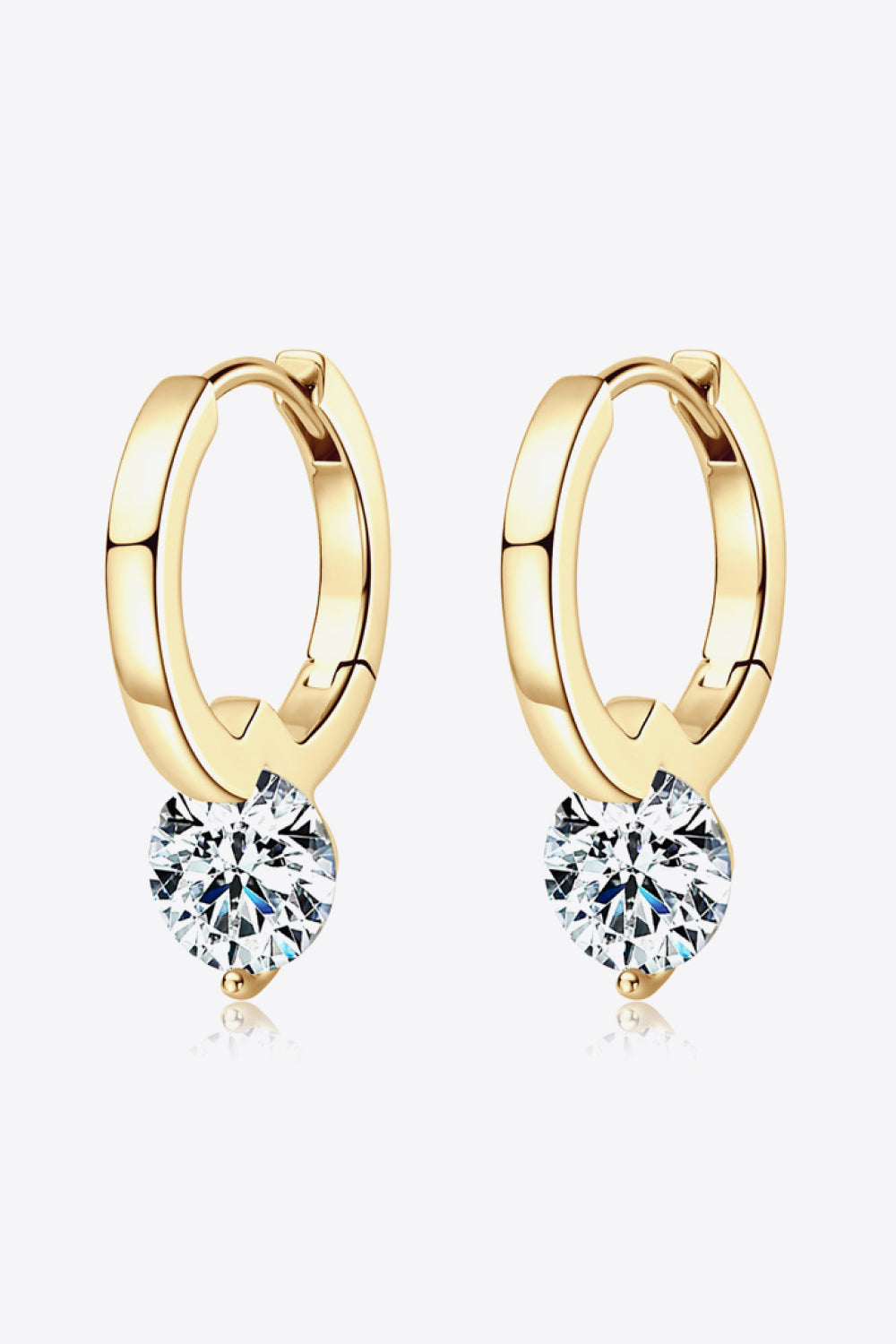 Gold huggie hoop earrings with a solitaire gemstone drop.