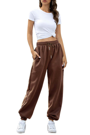 Relaxed-fit cuffed sweatpants in chocolate brown with drawstring waist and pockets.