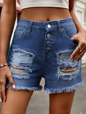 Navy distressed denim shorts with button-fly and frayed hem.