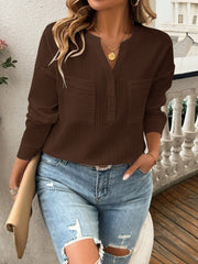 Chocolate textured henley blouse with two chest pockets and button placket.