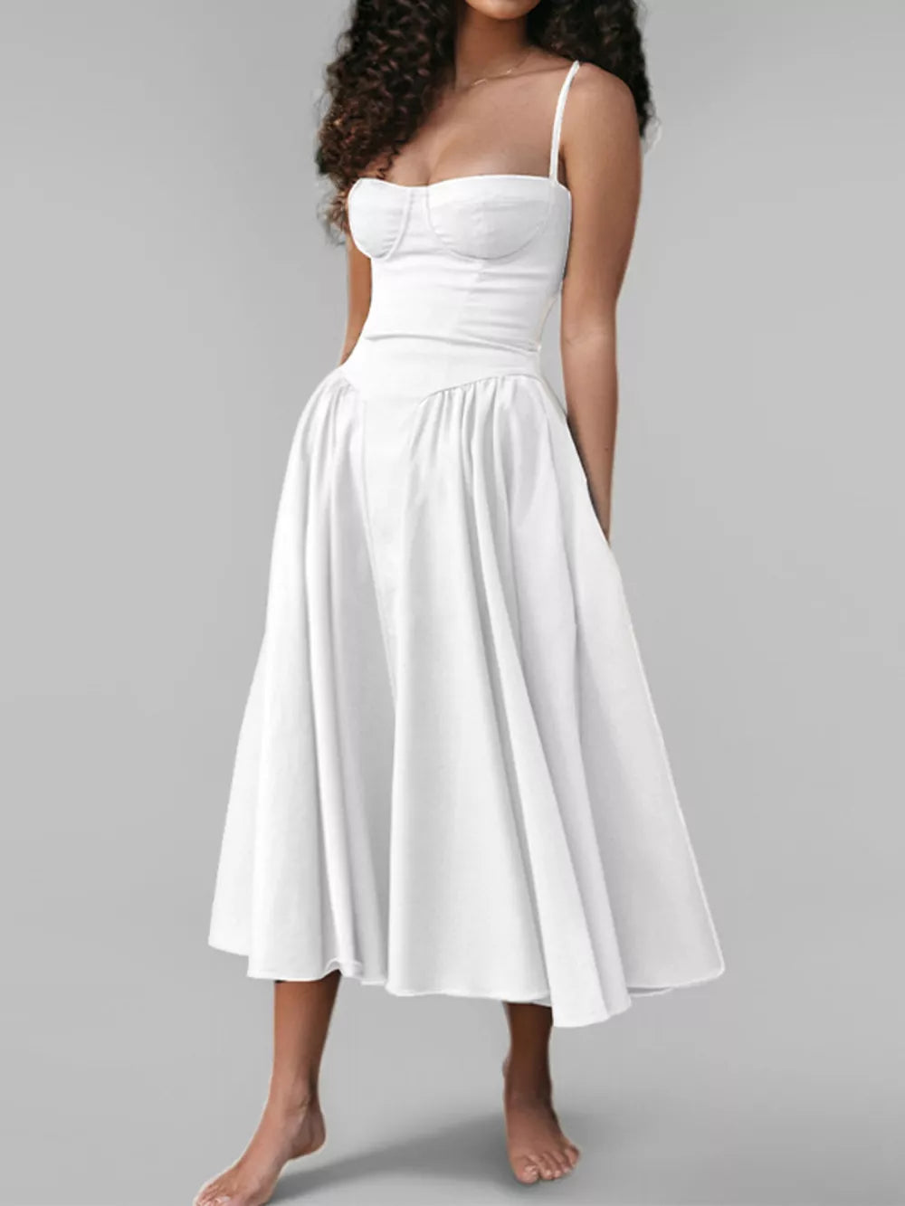 White sweetheart midi dress with spaghetti straps and full skirt