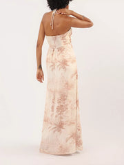 Tropical halter neck maxi dress in cream with smocked bodice and palm tree print.