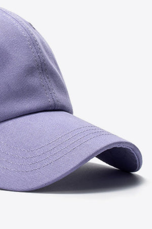 Purple cotton baseball cap with stitched details on the brim.
