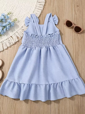 Sky blue baby dress with smocked bodice, ruffle hem, and bowknot shoulder straps.
