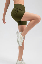 Army green ribbed contour active bike shorts with a high waist.
