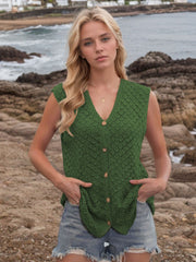 Openwork knit vest in dark green with V-neck and button front, styled casually.