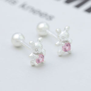 Silver bear stud earrings with pink zircon stone detail.