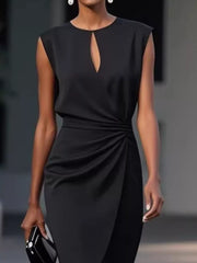 Black ruched dress with keyhole neckline and sleeveless design.