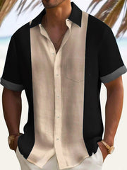Men's short sleeve button-down shirt with color block beige and black panels, chest pocket, cotton.