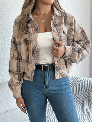 Cropped plaid shacket in taupe with gathered sleeves, button front, and chest pockets.