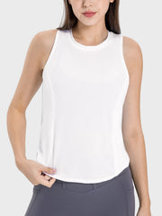 White performance tank top with a round neckline and subtle side mesh detail.