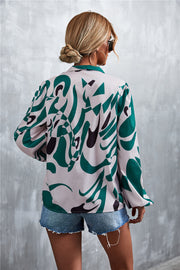 Women's green abstract print pussy bow blouse with balloon sleeves