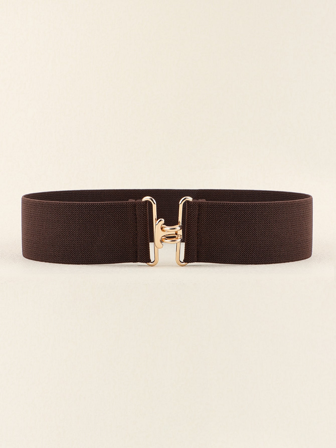 Chocolate elastic belt with sculpted gold buckle