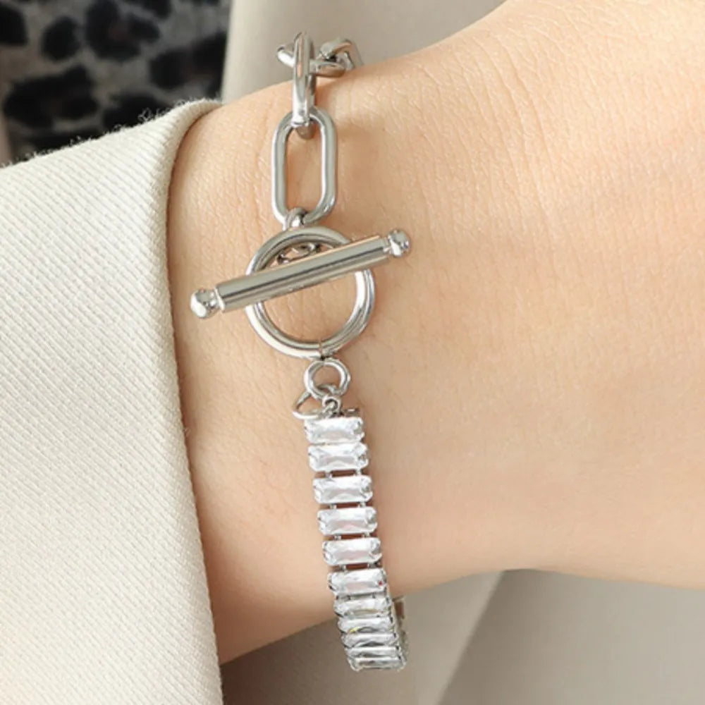 Silver chain toggle bracelet with baguette zirconia charm