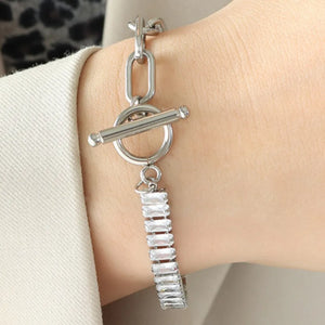 Silver chain toggle bracelet with baguette zirconia charm