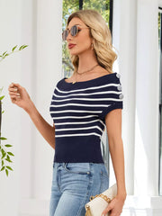 Dark blue and white striped knit sweater with decorative buttons on shoulder