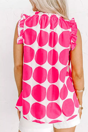 Polka dot frill tank top with ruffled neckline and sleeves in pink and white polyester.