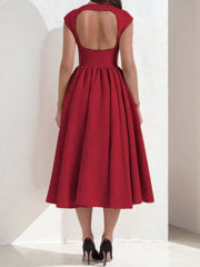 Deep red A-line midi dress with cap sleeves and a cutout back.