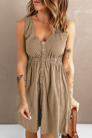 Khaki button-down mini dress with gathered waistline and V-neck.