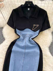 Buttoned denim patchwork bodycon dress with collared neckline and chain detail.