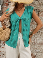 Turquoise open-knit sleeveless cardigan with tie-front detail and V-neck.