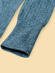 Blue textured knit long-sleeve top with ribbed cuffs and hem detail.