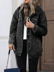 Oversized washed grey denim jacket with button front and chest pockets.