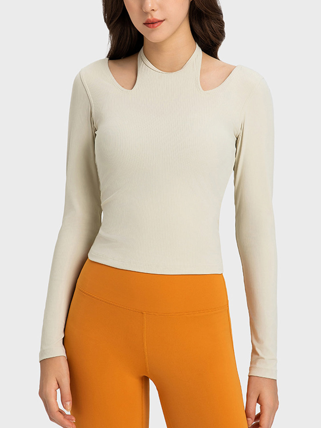 Ivory ribbed long sleeve sport top with cutout shoulders