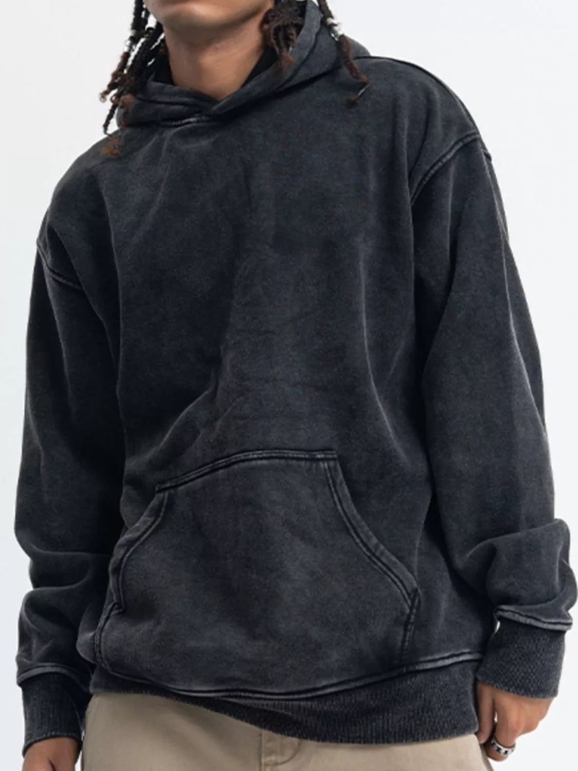 Vintage wash black long-sleeve hoodie with front pocket and relaxed fit