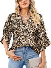 Leopard print V-neck blouse with flutter sleeves and a relaxed fit.