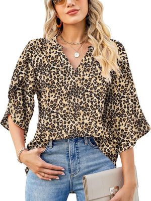 Leopard print V-neck blouse with flutter sleeves and a relaxed fit.