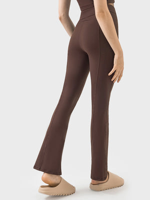 Sculpted flare active trousers in chocolate brown with a zip detail and flared leg.
