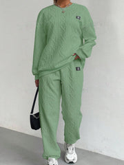 Textured cable knit loungewear set in Gum Leaf green, featuring a crewneck sweatshirt and relaxed fit pants.