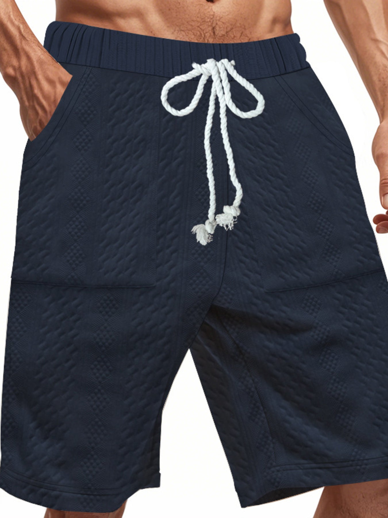 Navy blue quilted texture drawstring men's chino shorts with diamond pattern.