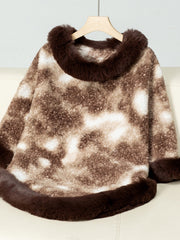 Faux fur trimmed camo poncho in chocolate brown and white, with fuzzy texture and trim.