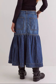 Denim midi skirt in dark wash with flounce hem and patch pockets.