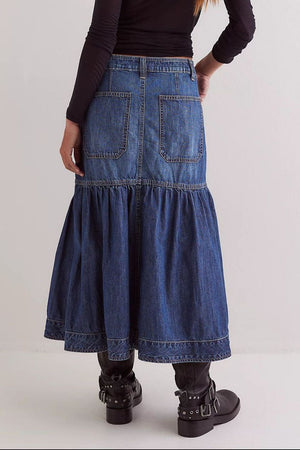 Denim midi skirt in dark wash with flounce hem and patch pockets.