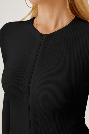 Black ribbed long sleeve bodysuit with a zippered plunge neckline.