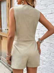 Khaki cotton tailored vest and pleated shorts set, showing back view.