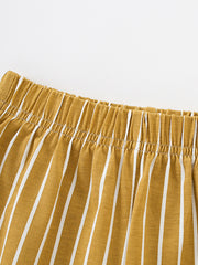 Toddler shorts with elastic waistband and white vertical stripes on apricot cotton fabric.