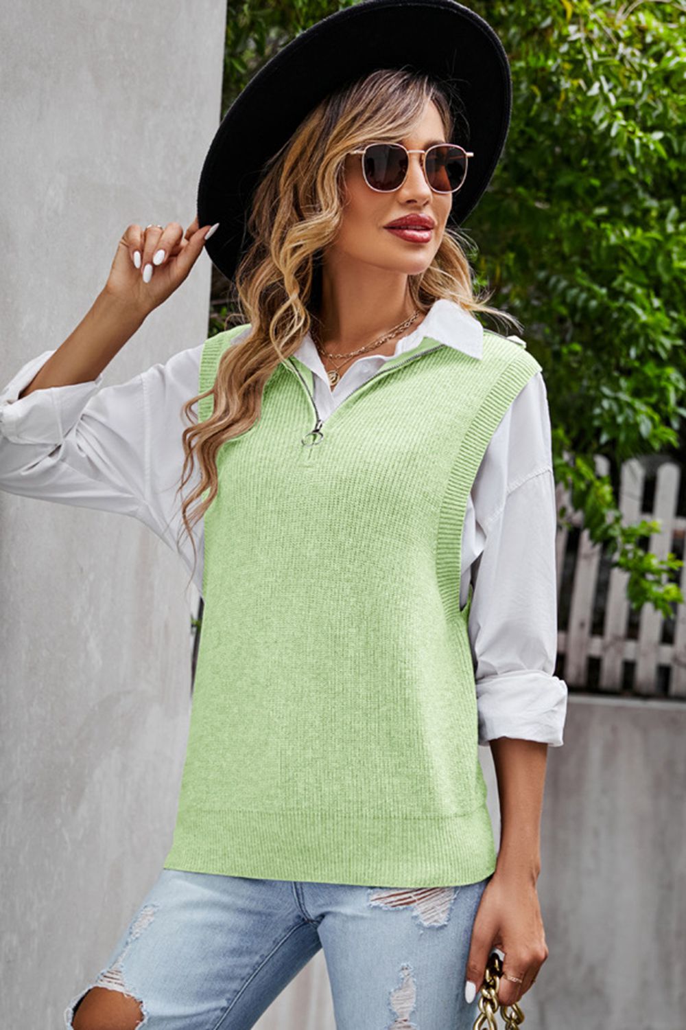 Yellow-Green ribbed knit vest with zip-neck and collar, styled over a white collared shirt.