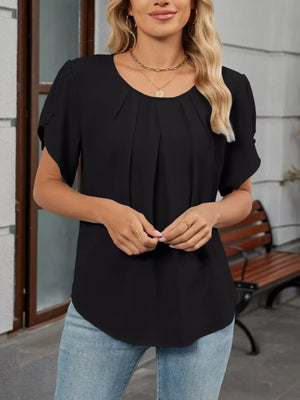 Black pleated short sleeve polyester blouse with round neckline.