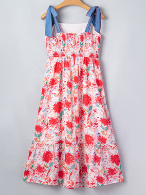 Floral print midi dress with smocked bodice and tie-shoulder straps.