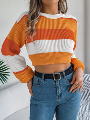 Tangerine acrylic balloon sleeve crop knit sweater with block stripes.