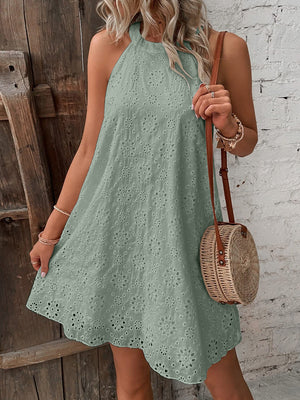 Sage halter neck eyelet trapeze dress with a scalloped hem.